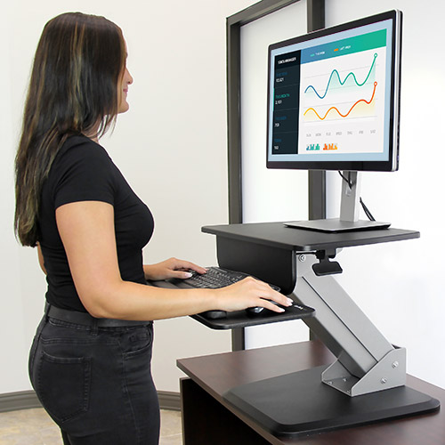 The sit-to-stand workstation lets you change to a standing position in moments with the one-touch height adustment