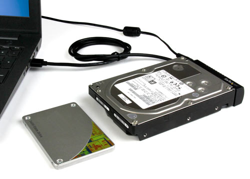 ?An external solid-state drive connected to a laptop through the USB 3.1 to SATA adapter 